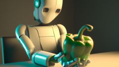Ein Roboter hält eine grüne Paprika